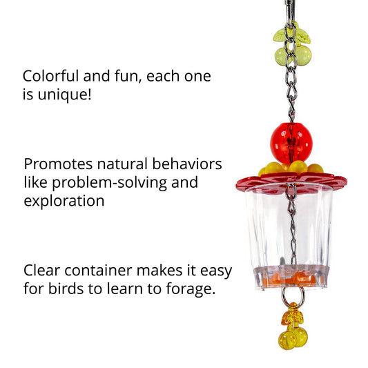 The foraging toy features a transparent food cup and colorful decorations.