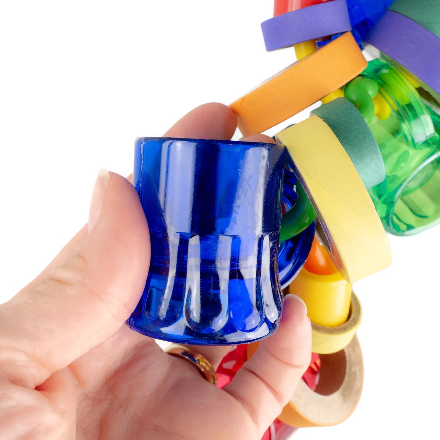 A close up of the bird toy.