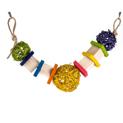 A single strand hanging toy with vine balls, balsa cubes and pine chippers. The color scheme is rainbow colors.