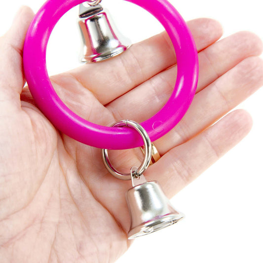 Close up of the bottom of the bird toy held in a hand.