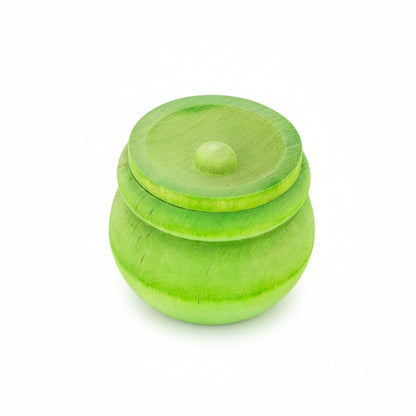 A small round wooden box with a matching lid, shown on a plain white background. The box and lid are bright lime green color with natural wood grain visible.