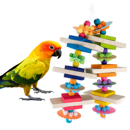 A colorful hanging bird toy made of wood, with various colored wooden blocks and beads, and a yellow bird perched near it.